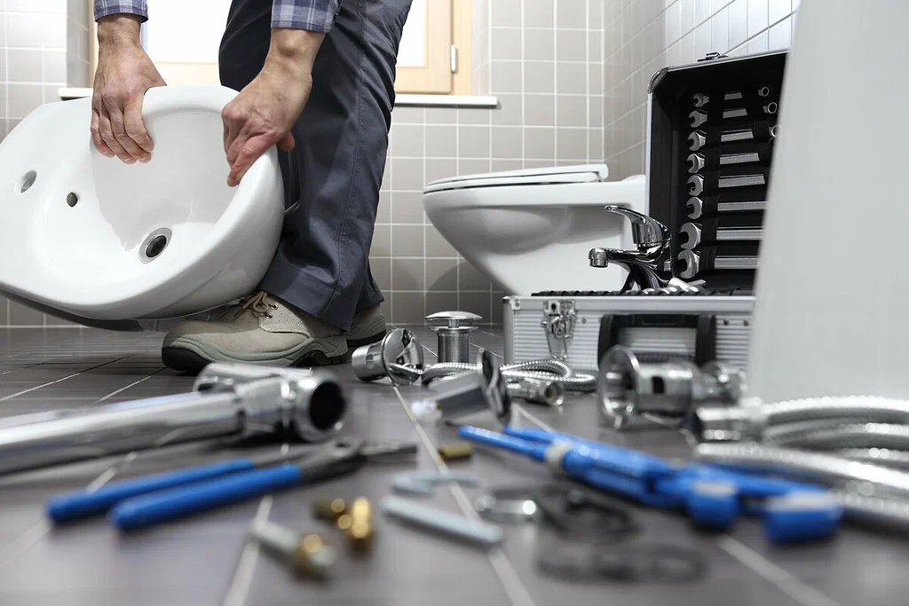 Plumbing tools prepared for a bathroom repair in Estero